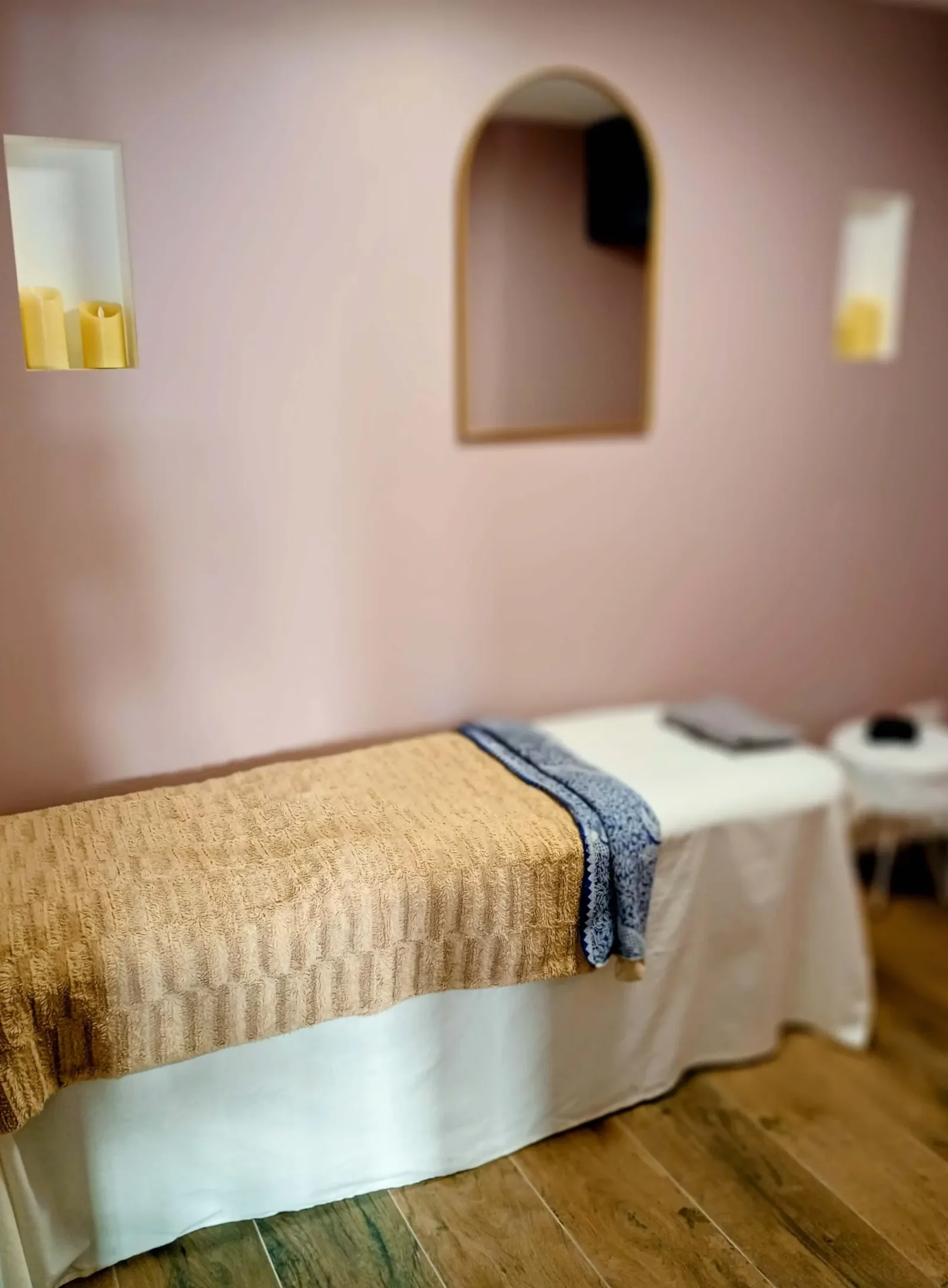 The Wild Rose treatment room — calm lighting and warm tones